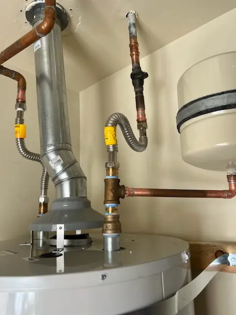 Water heater installation and plumbing repair in Possum Hollow